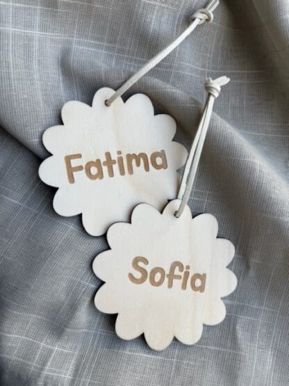 Bagtag - Blomma